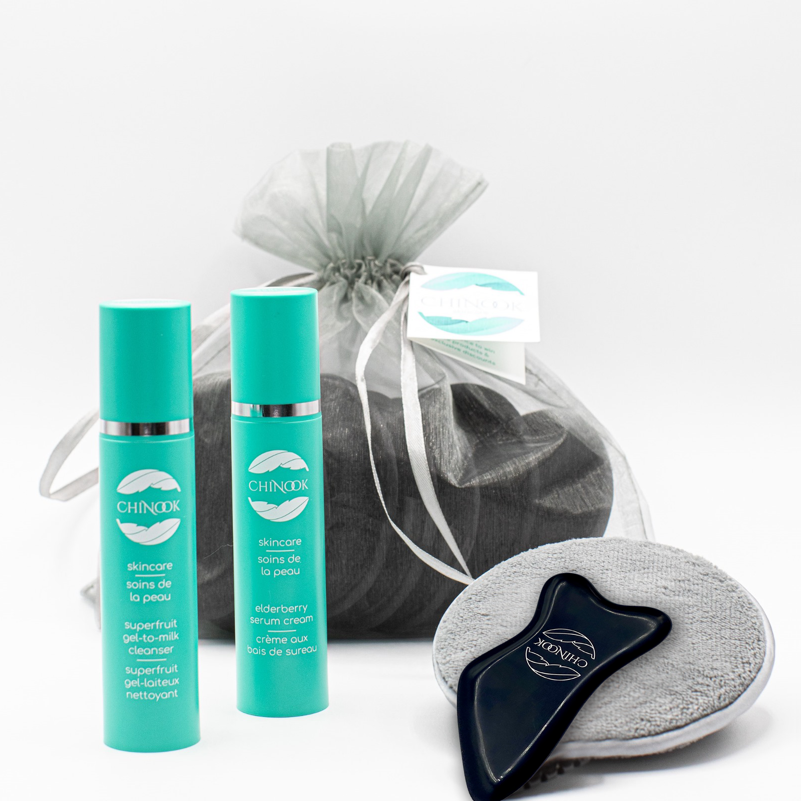 Superfruit Gel-to-Milk Cleanser and Elderberry Serum Cream Bottles - Chinook Skincare Website Banner Bian Stone and Gua Sha Tools